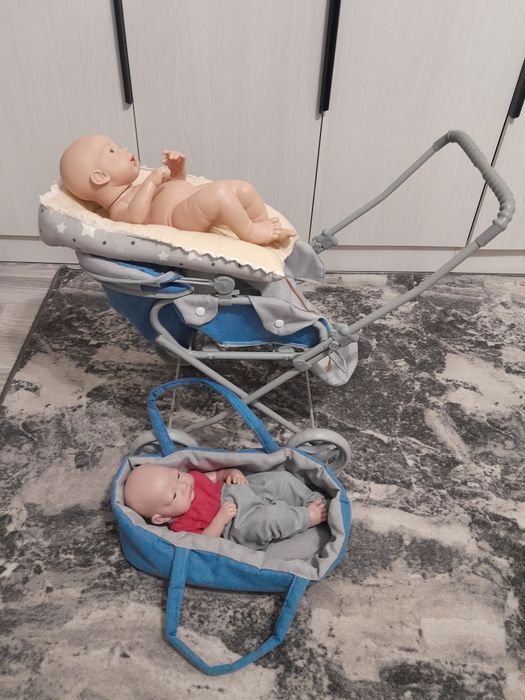 Детская коляска с куклами