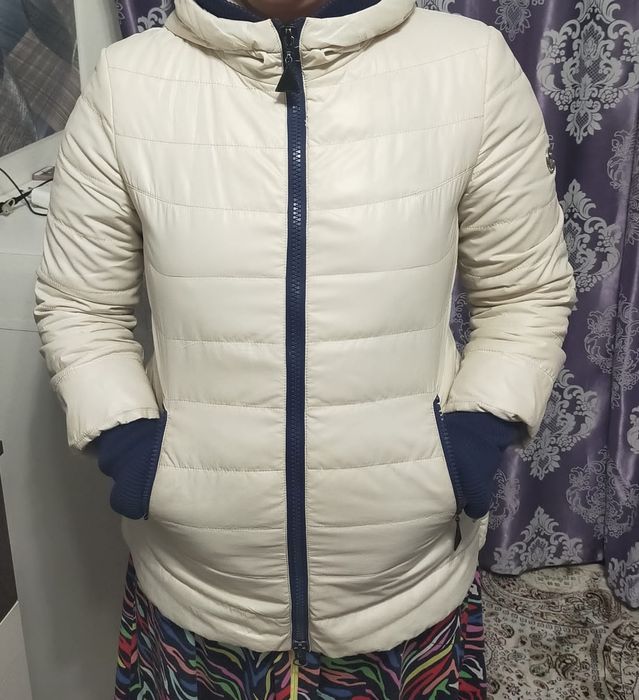 Продам зимнию  куртку новый
