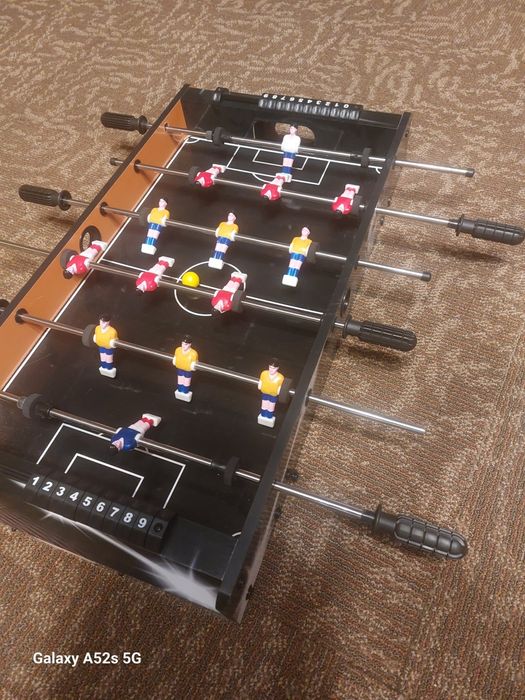 Joc de fotbal ,masa fotbal