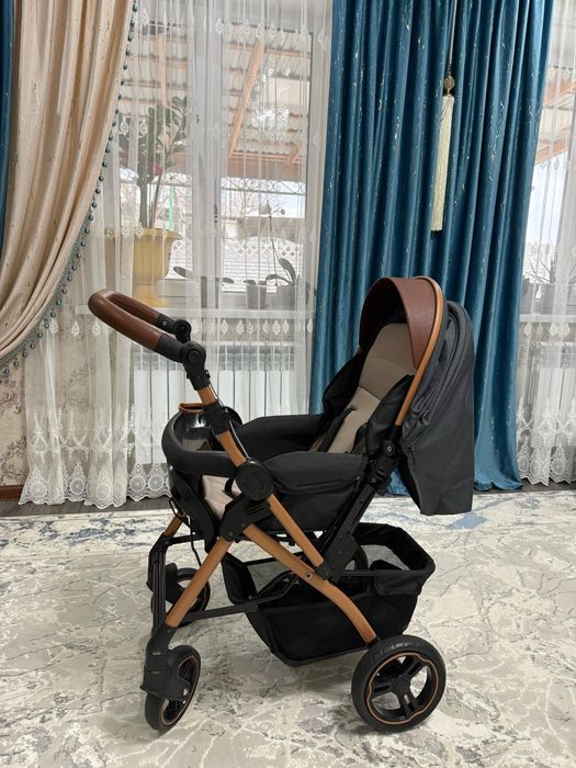 Детская прогулочная коляска