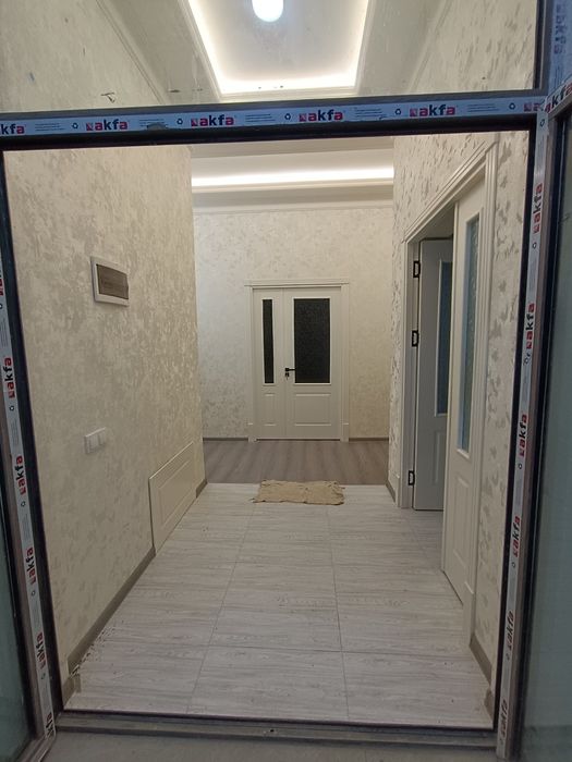 Янги пишган гишт дан курилган 2 соток 5 хона кухня подвал 3 санузел,