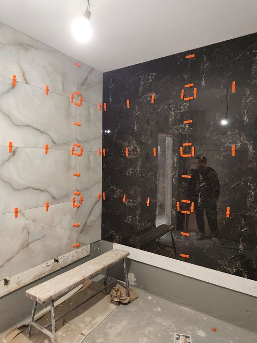 Execut lucrări de construcții interioare și exterioare