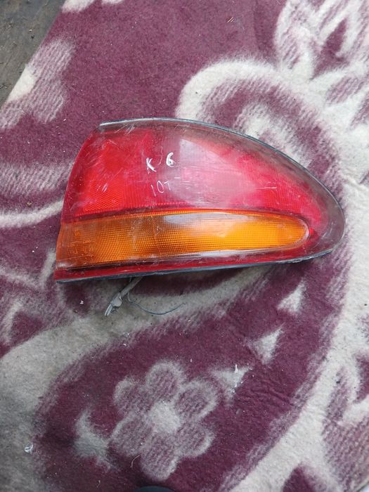 Фонарь Мазда Кседокс 6