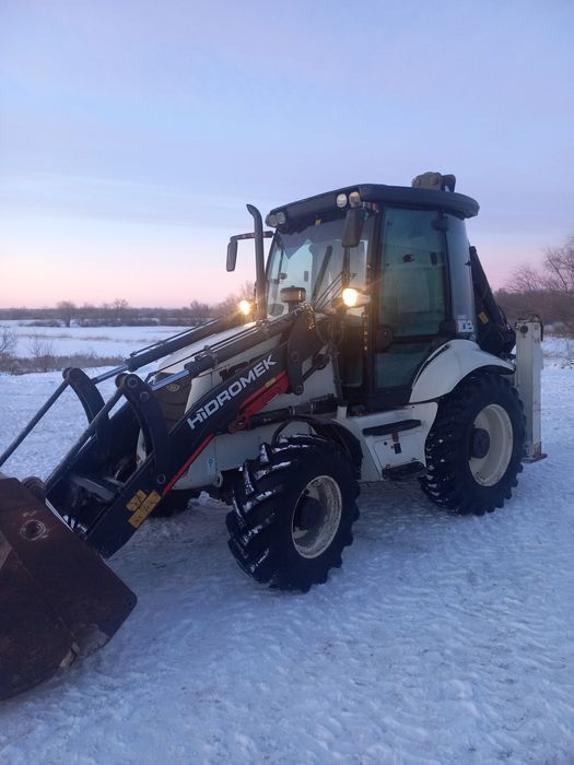 Продаю Экскаватор погрузчик Гидромек 102 в.