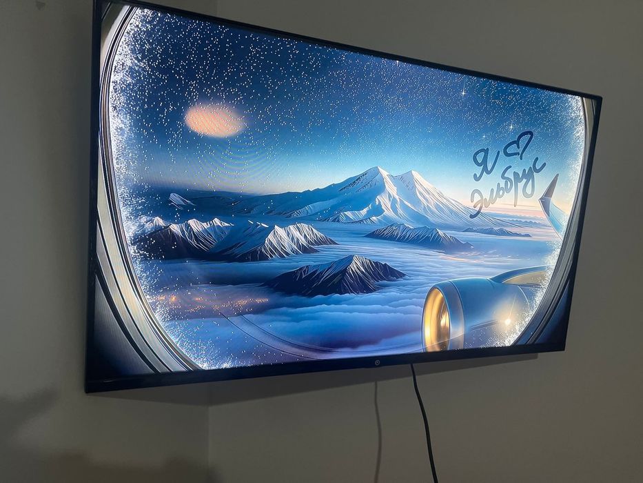 Телевизор с диагональю 81 см