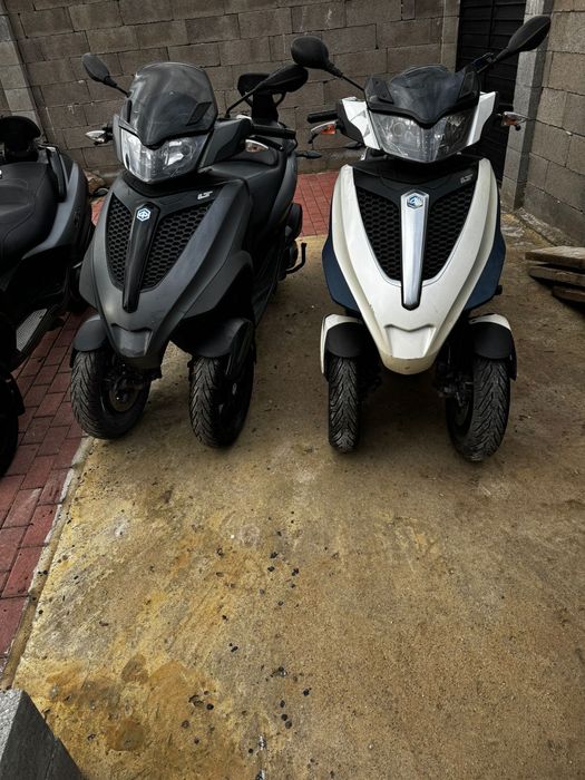 De vazare Scutere MP3