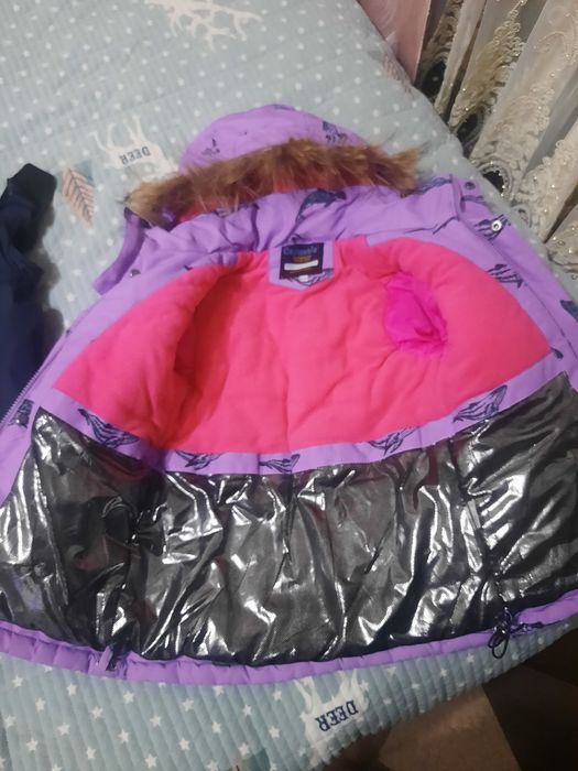 Продам зимний комбинезон на девочку