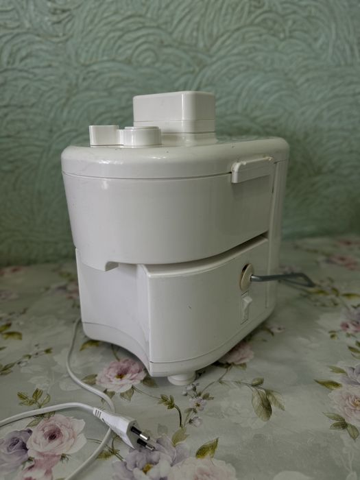 Соковыжималка электрическая