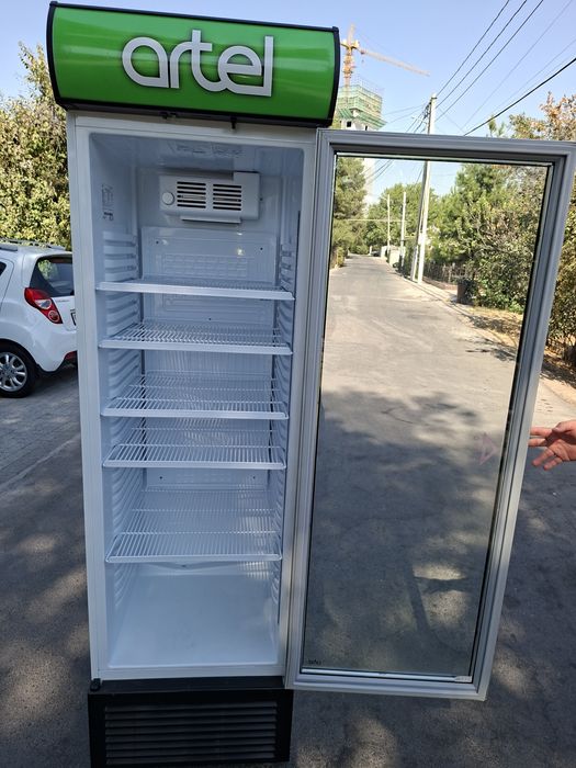 Срочно продам витрине холодильник артел как новый гарантия 3года есть