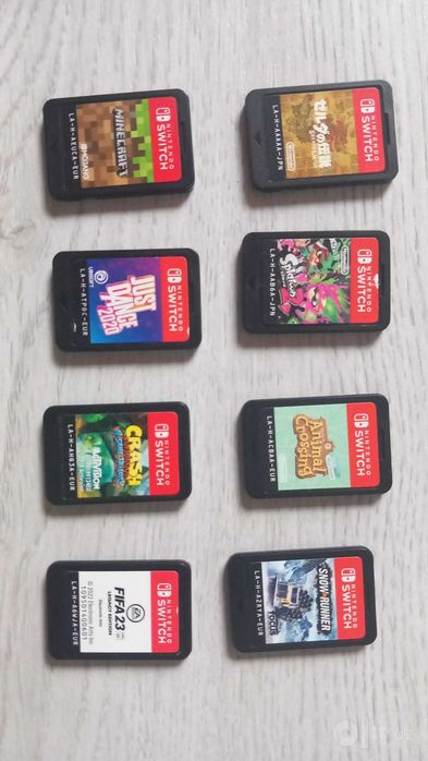 Nintendo Switch Lite (Бирюзовый/Синий) + чехол + 8 игр
