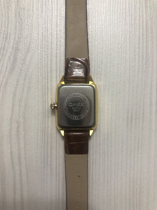 Omex quartz часы наручные