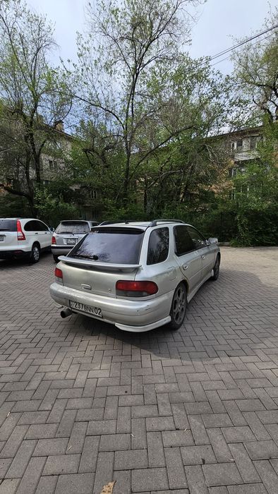 Subaru Impreza WRX 2 литра, моно турбо.