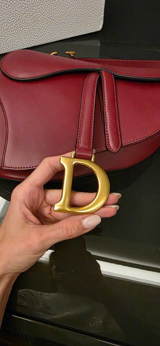 Authentic Dior Saddle bag in burgundy color