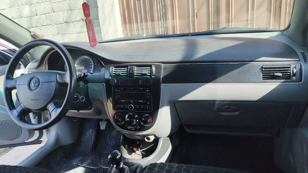 Lasetti 1.6  xolati :yaxshi