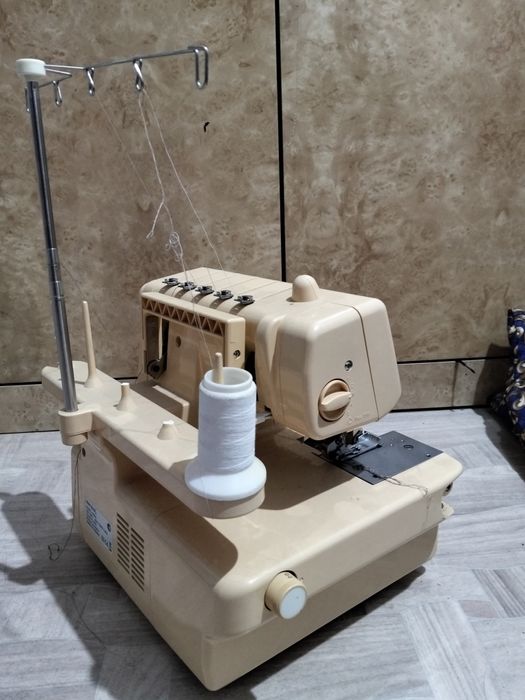 Продам коверлог Merrylock 5550A