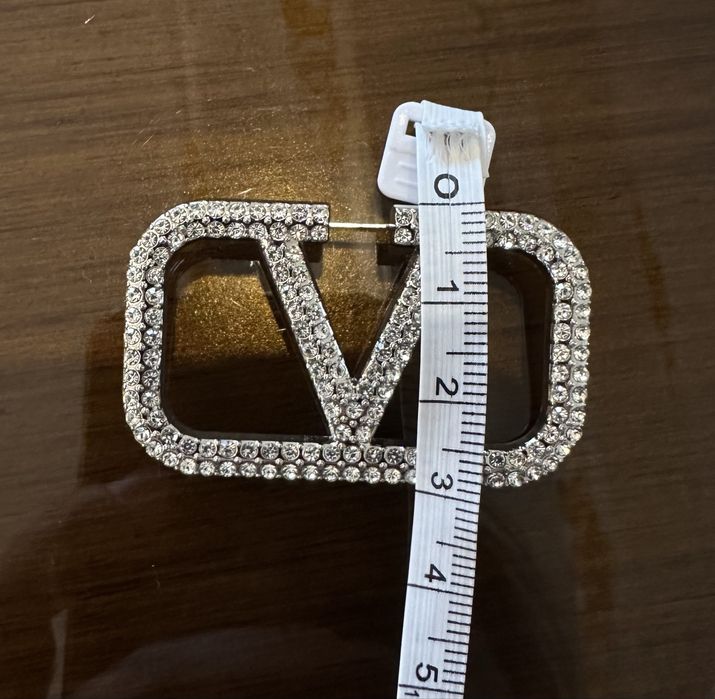 Brosa V inscriptionata