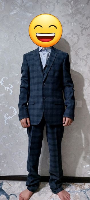 Продам новый костюм