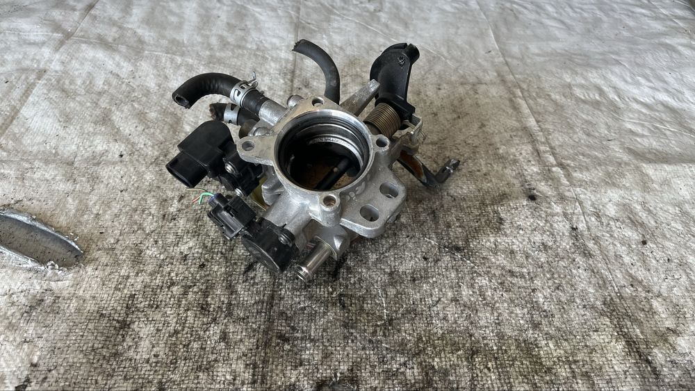 Daihatsu Sirion 1998- 1.3i дросел