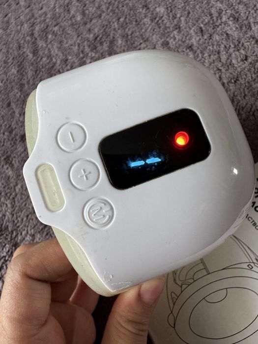 Электрический молокоотсос