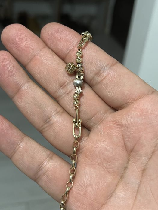 Bratara aur tip Pandora model deosebit 14k persoana fizica