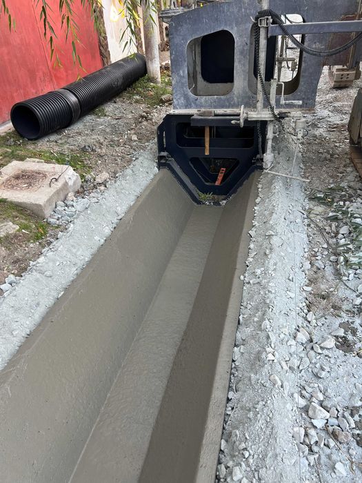 Santuri si rigole betonate  rigole de acostament realizate mecanizat