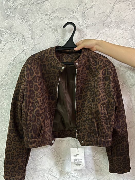 Leopard print suede jacket.