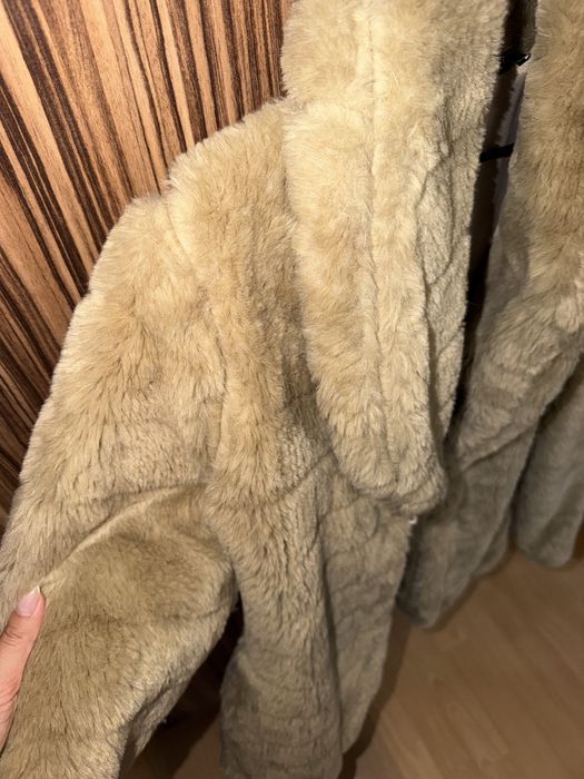 Космато кафяво палто