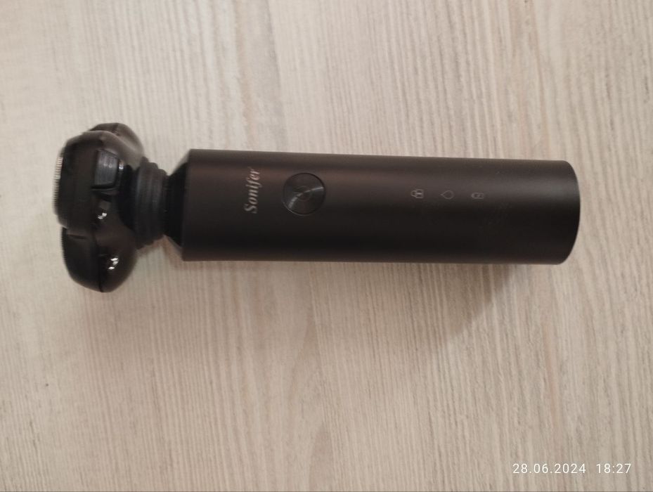 Электробритва "Sonifer".