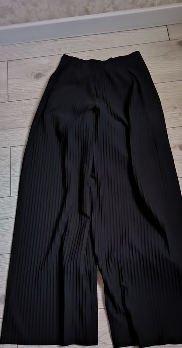 COS (брюки с карманами женские