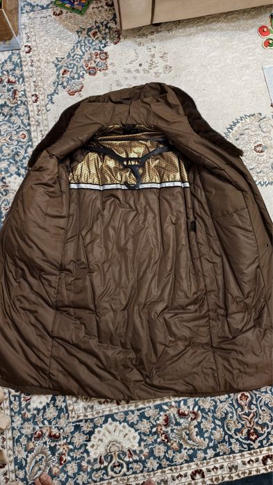 Продам зимний пуховик