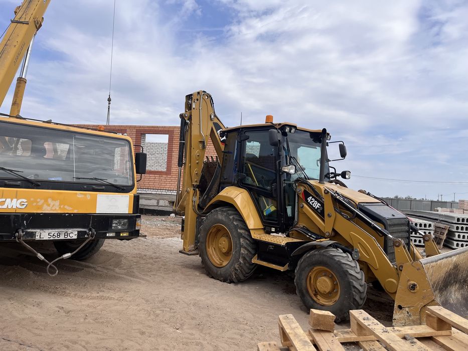 Эксковатор погрузчик