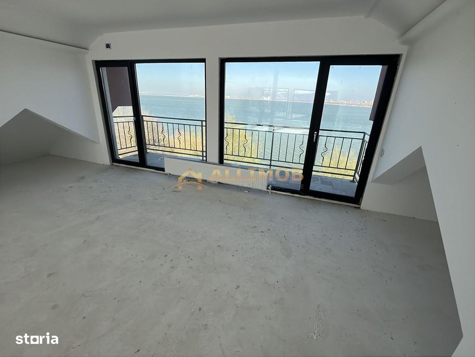 Eleganta la malul lacului- Vila premium cu ponton privat.