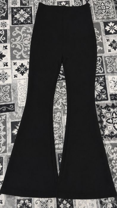 Vand pantaloni evazati