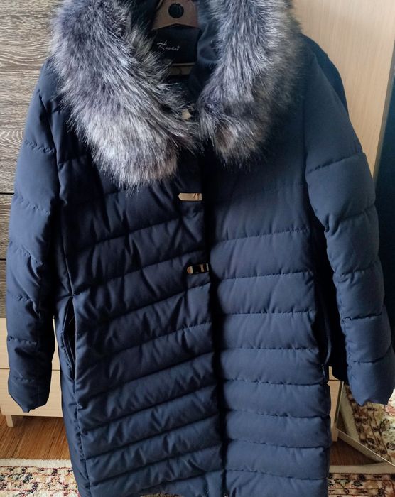 Женский пуховик с капюшоном