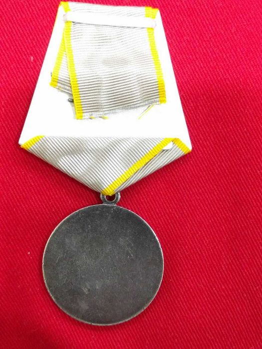 Медаль За боевые заслуги.