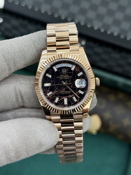 Rolex Day-Date 40 Baguette Eisenkiesel