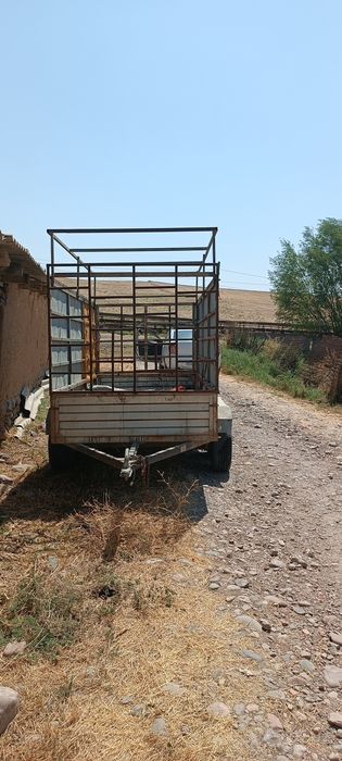 Автоприцеп для легковых автомобилей двухмостный.
