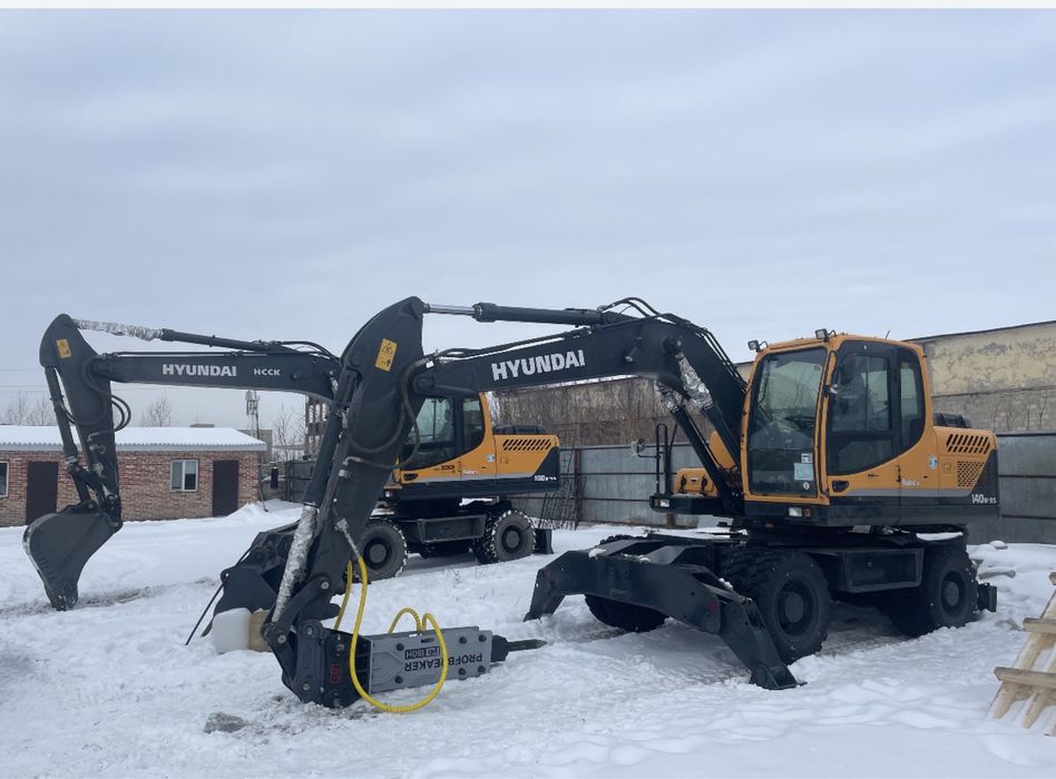 Аренда колесного эксковатора с гидромолотом