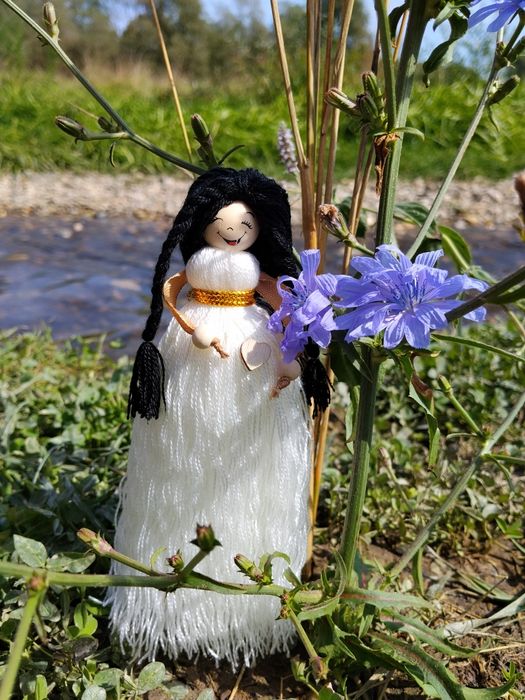 Păpușa “Mămica cu zâmbet” – Simbol al vieții și iubirii