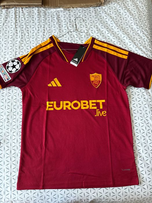 Tricou Roma home rosu 2026-2027 sezonul nou cu badge champions league