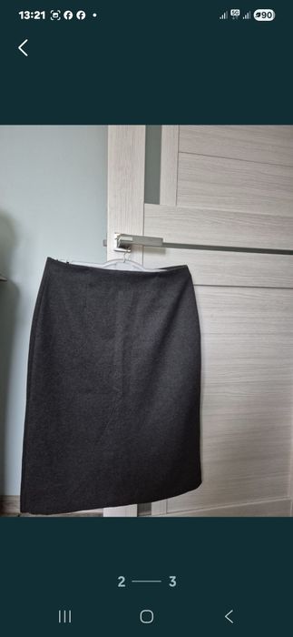 Продаю новая юбка,серая,размер 48.ниже колении