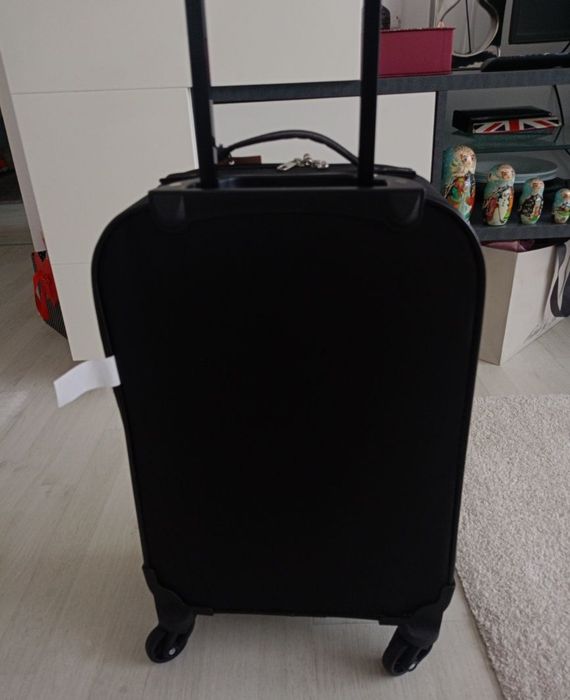 Vând troler 54 cm, produs de calitate superioara.