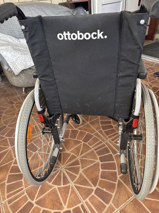 Инвалидная коляска