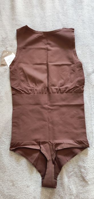 Оформящо боди прашка