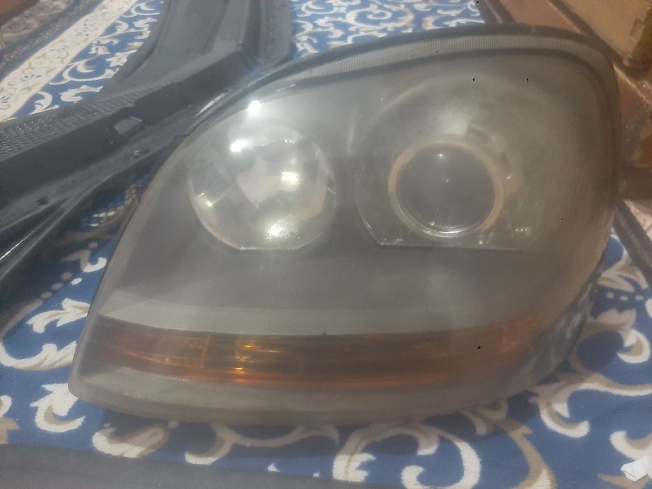 Фара нисан тино левая