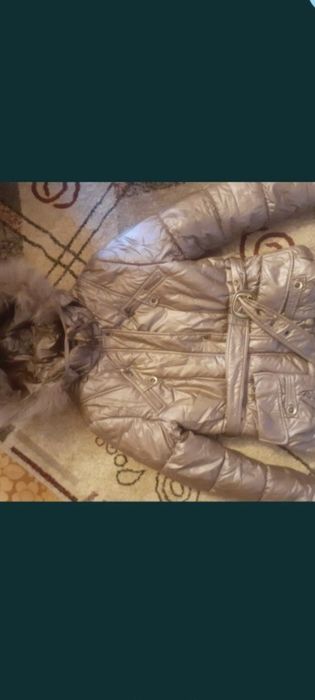 Продам пуховики.