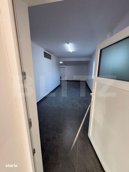 Spatiu 245 mp cu 10 parcari, curte logistica si rampa marfa – DN Rac
