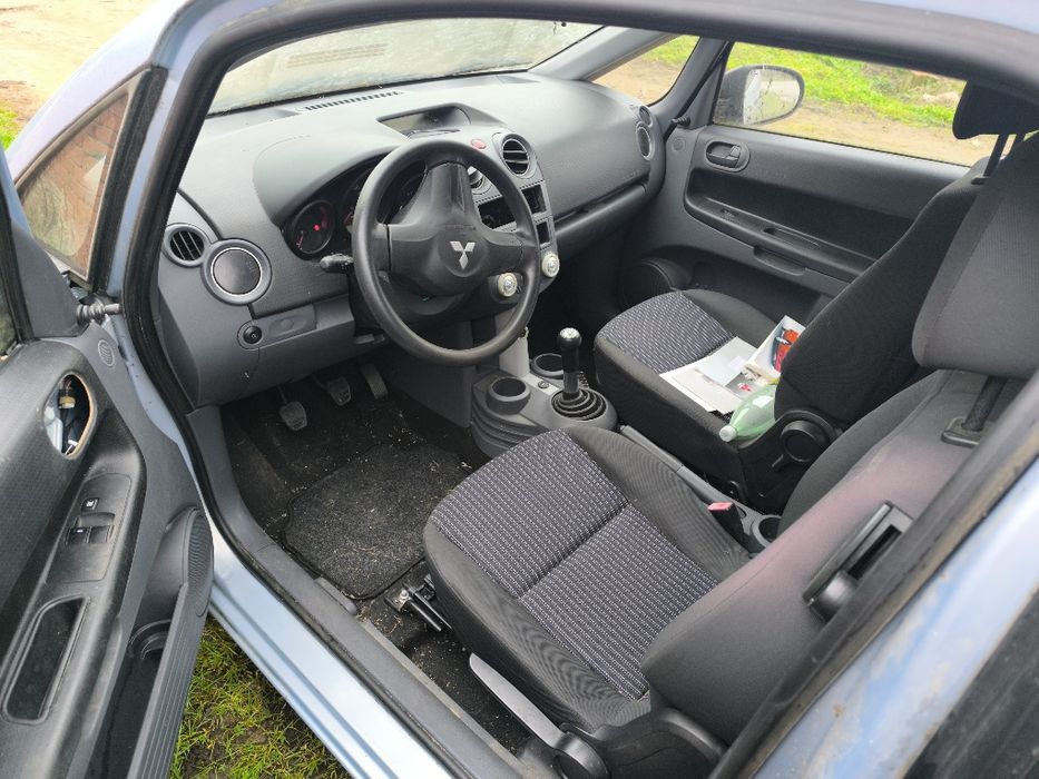 На части Mitsubishi Colt