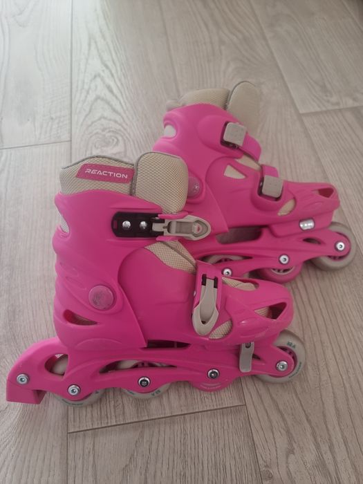 Роликовые коньки