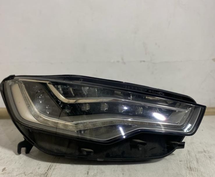 Привозные фары на Audi A6C7
